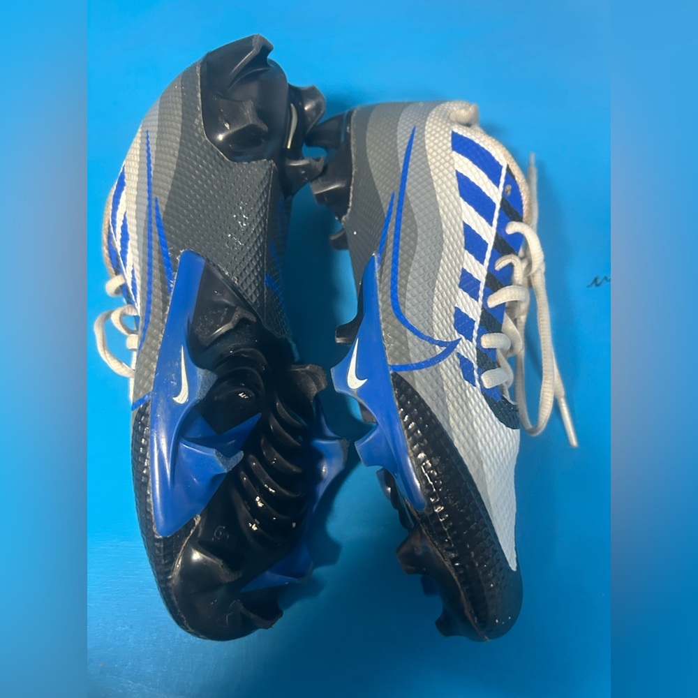 Nike Vapor cleats size 8
Colors are White,black,blue and Silver 
Great Condition